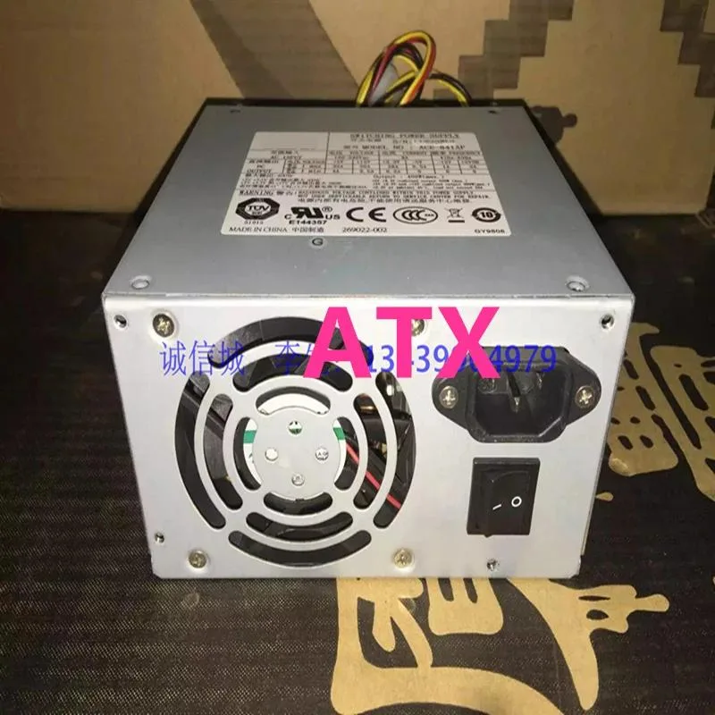 Silver rectangular ATX power supply unit with ventilation grille and label showing 400W model ACE-841AP