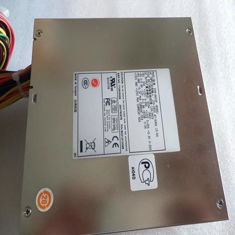 Rectangular ATX power supply unit with matte black finish and cooling fan grille