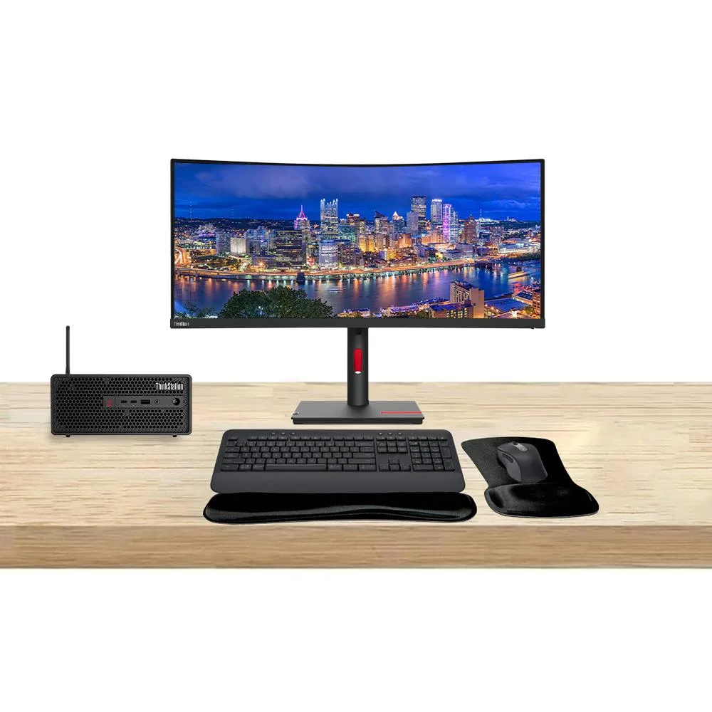 Small-form-factor workstation tower with 34-inch curved ultrawide monitor, graphite wireless keyboard and mouse set with gel wrist rest