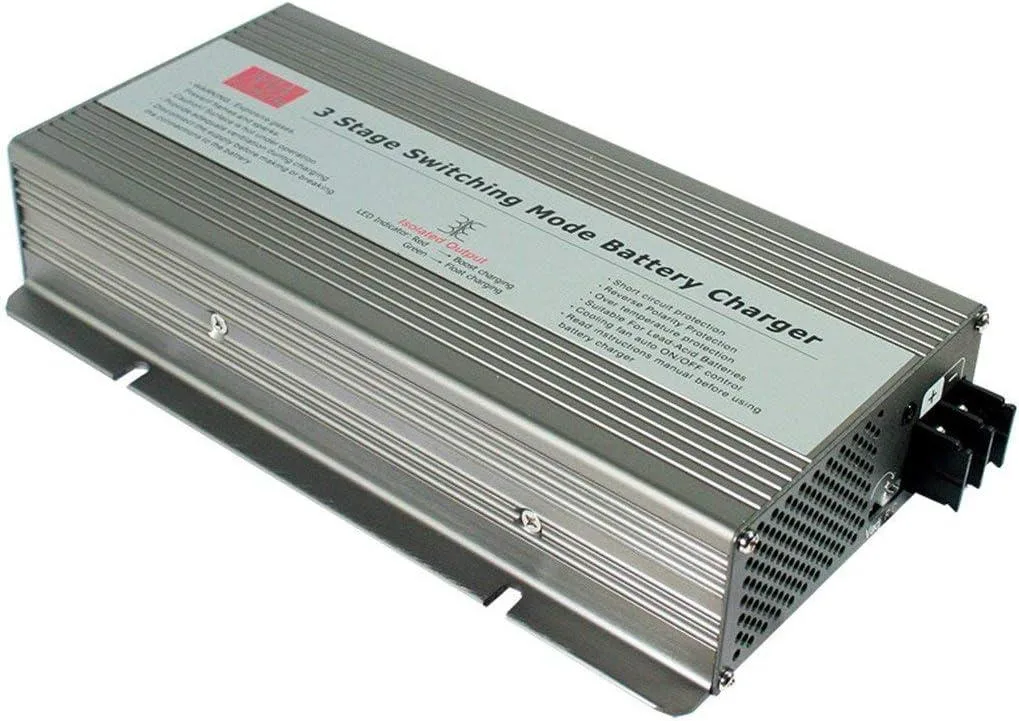 Rectangular metal power supply unit with ventilation slots and a voltage selector switch