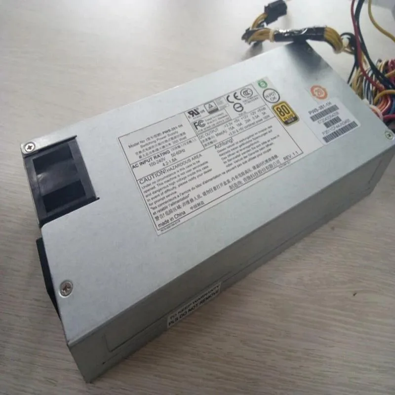 Silver 1U power supply unit with rear fan grille and power socket
