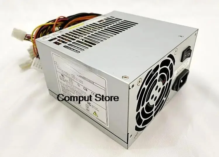 Rectangular ATX power supply unit in metal casing with fan grille and cable bundle