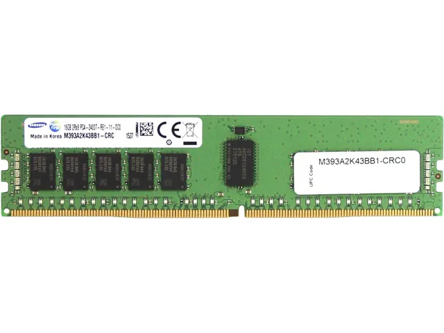 Green rectangular circuit board with gold edge connectors and black memory chips
