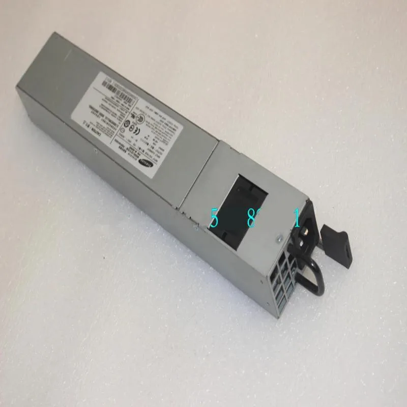 Rectangular silver ATX power supply unit with ventilation grille and label showing 450W