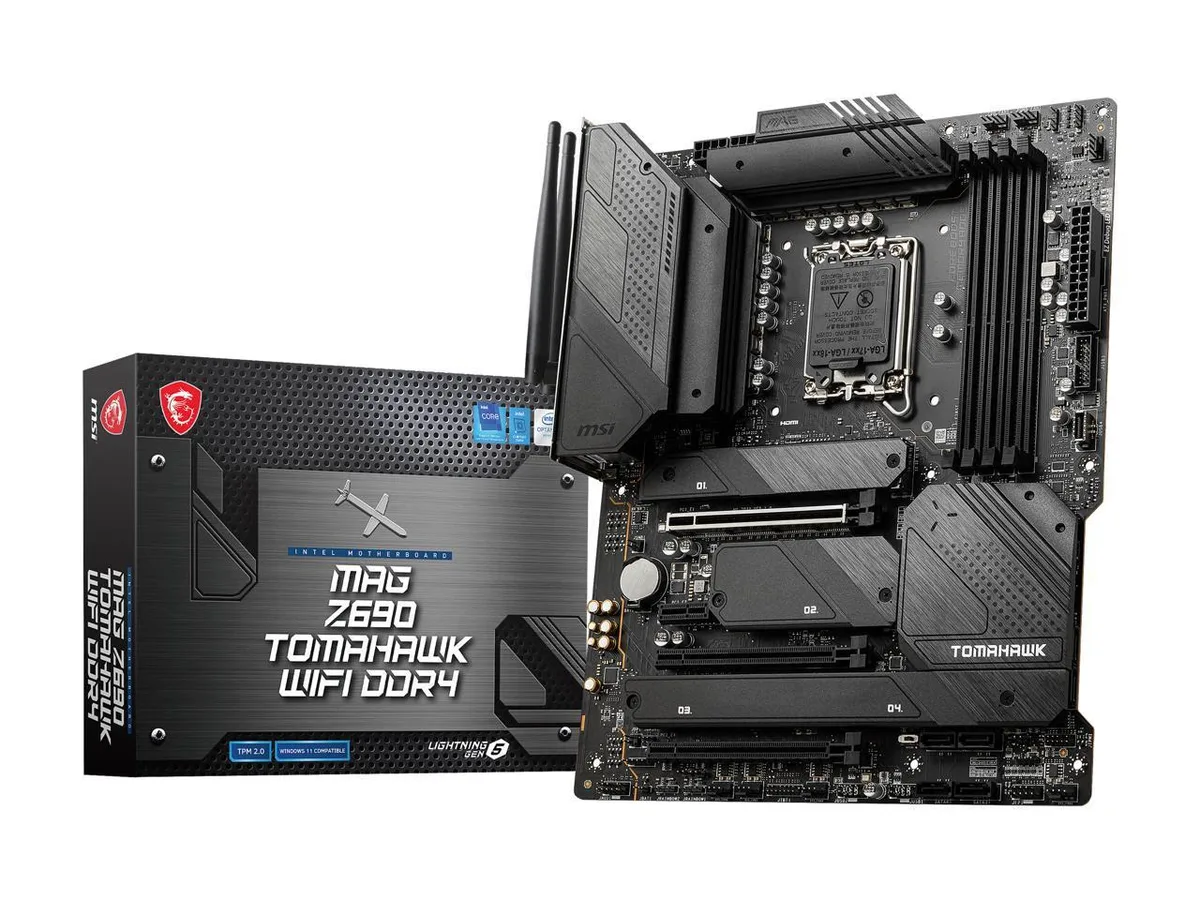 Black ATX motherboard with silver heatsinks and rear I/O shield