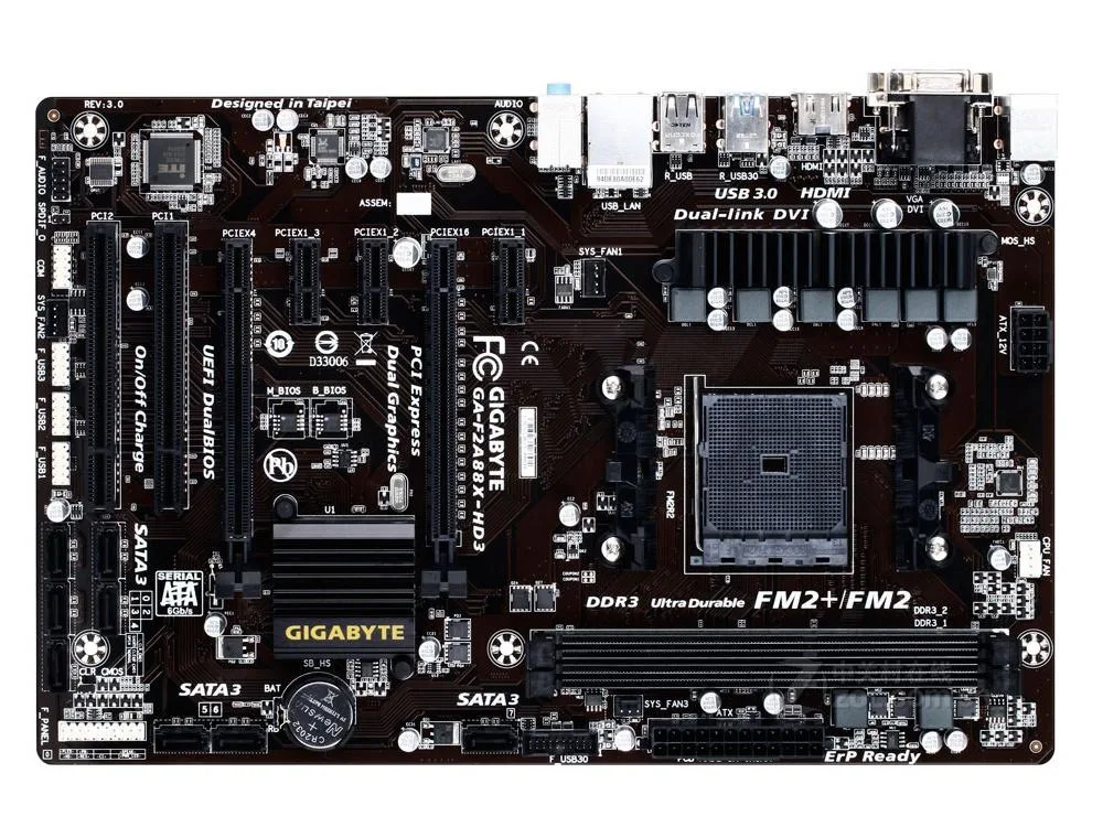 ATX motherboard, green PCB with black and blue slots, metal battery, I/O shield and SATA cable