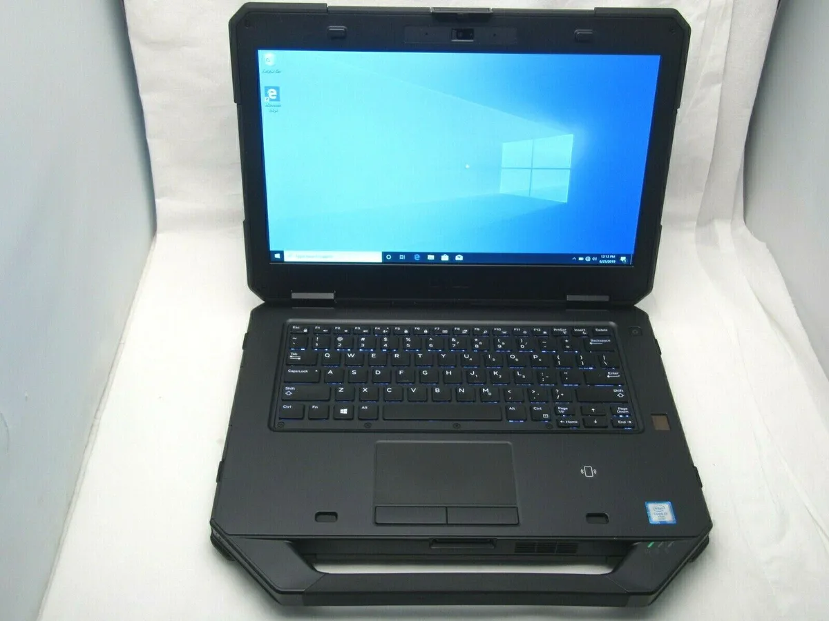 Thick dark grey rugged laptop closed showing reinforced corners and sealed ports