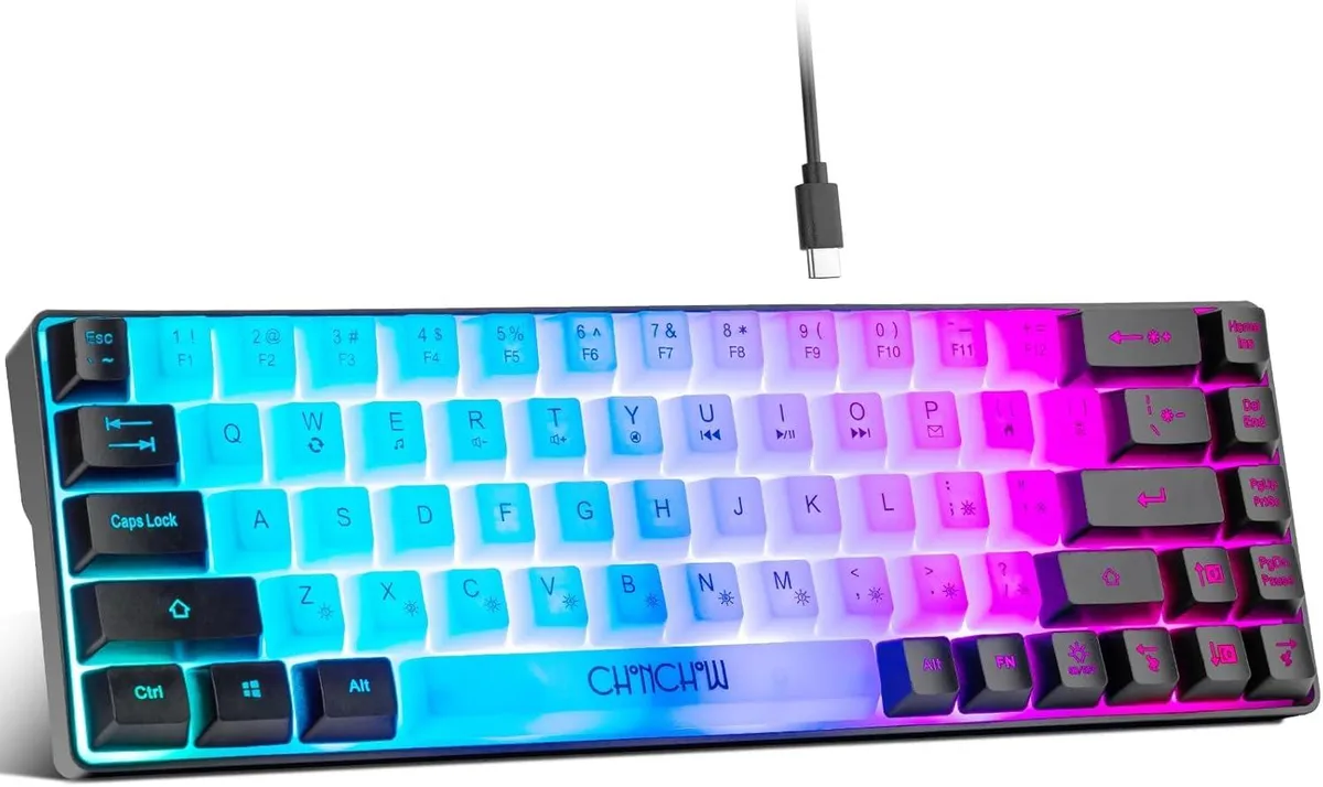 White and black compact 60 percent keyboard with 68 keys and RGB backlighting