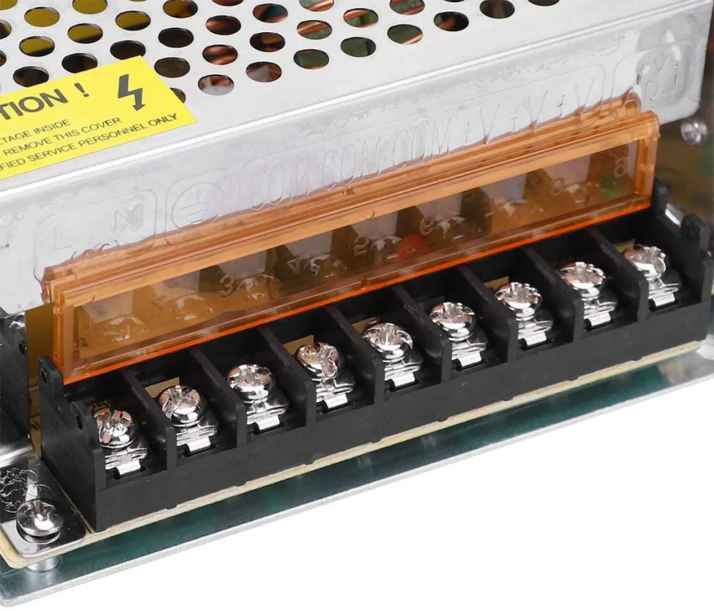 Rectangular aluminium power supply unit with screw terminals and voltage adjustment trimmer