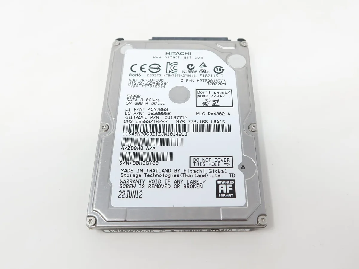 Silver 2.5 inch SATA hard drive with circuit board visible