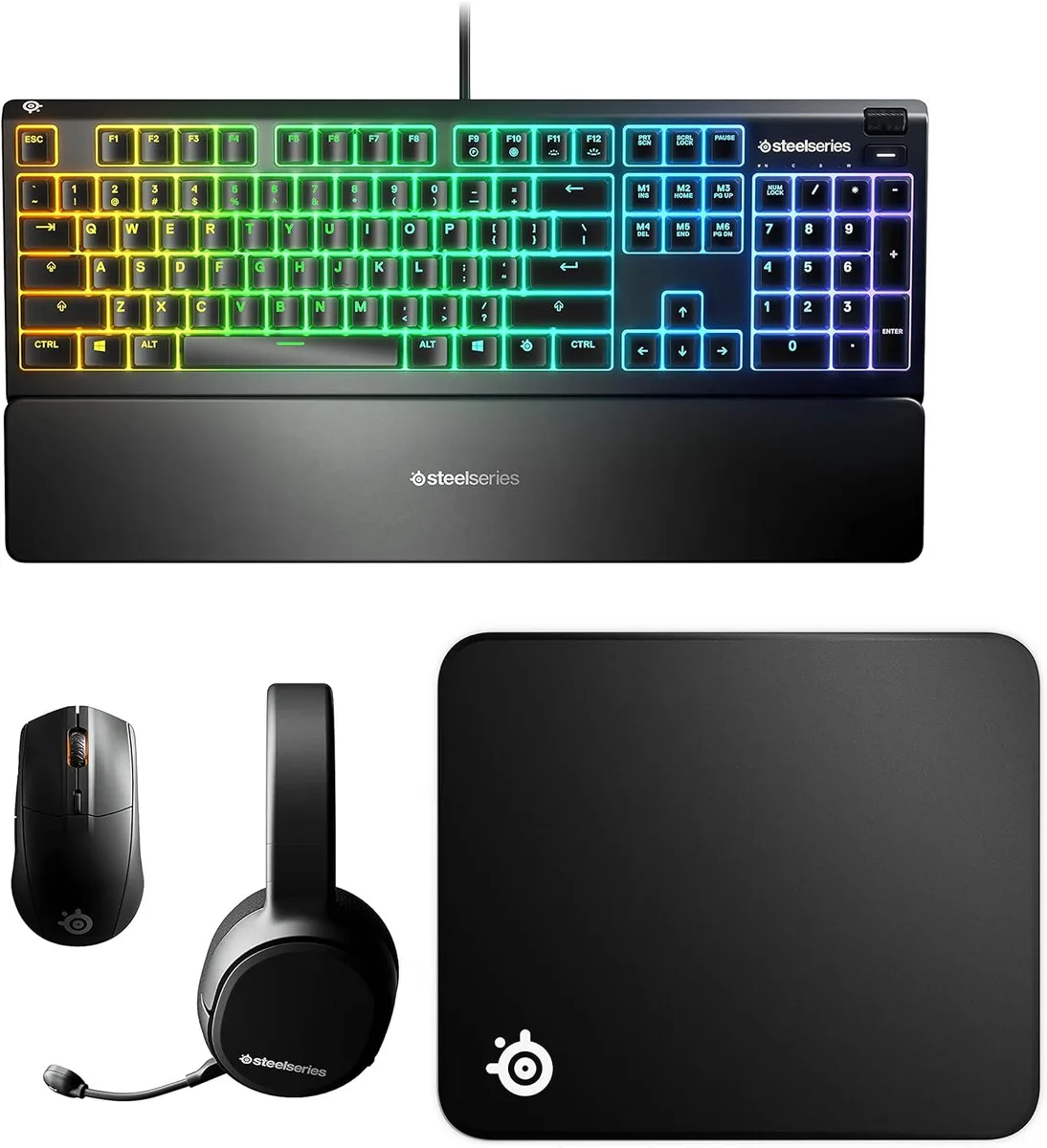 Four gaming peripherals on a desk: keyboard, wireless headset, wireless mouse, cloth mousepad