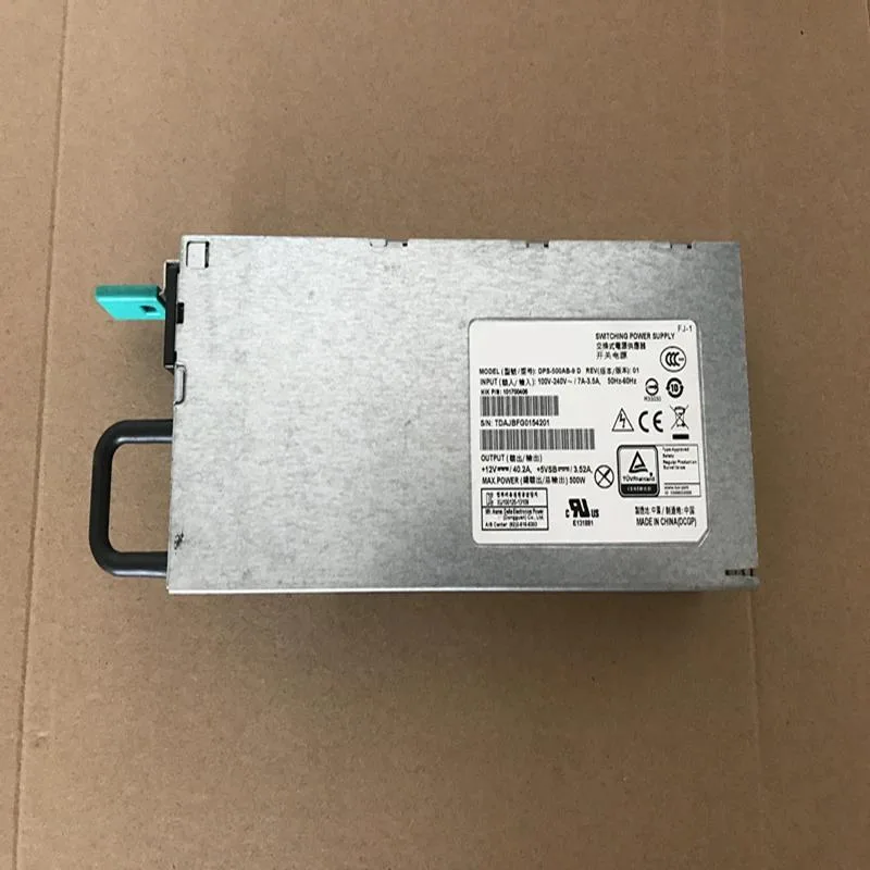 Silver ATX power supply unit with fan grille and cable bundle