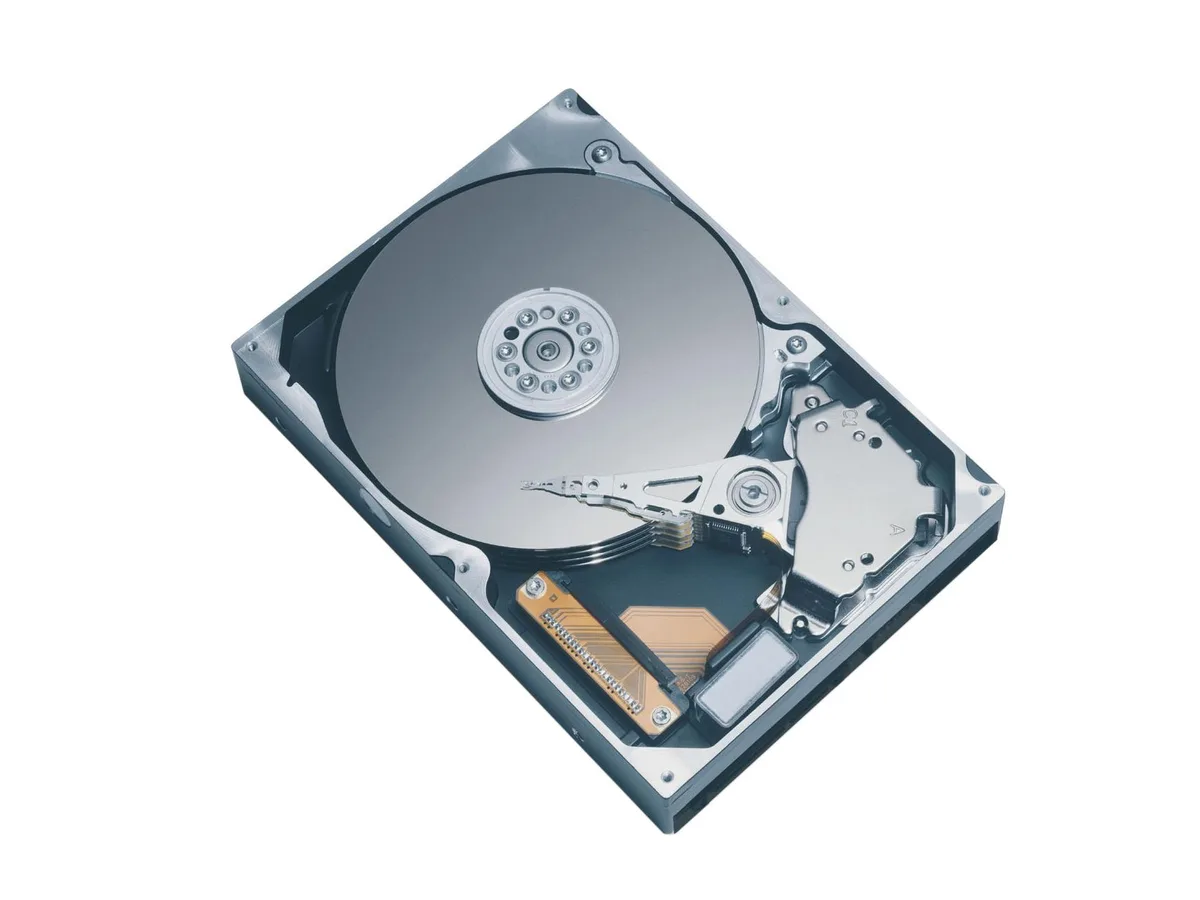 Silver 3.5 inch bare hard drive with exposed circuit board