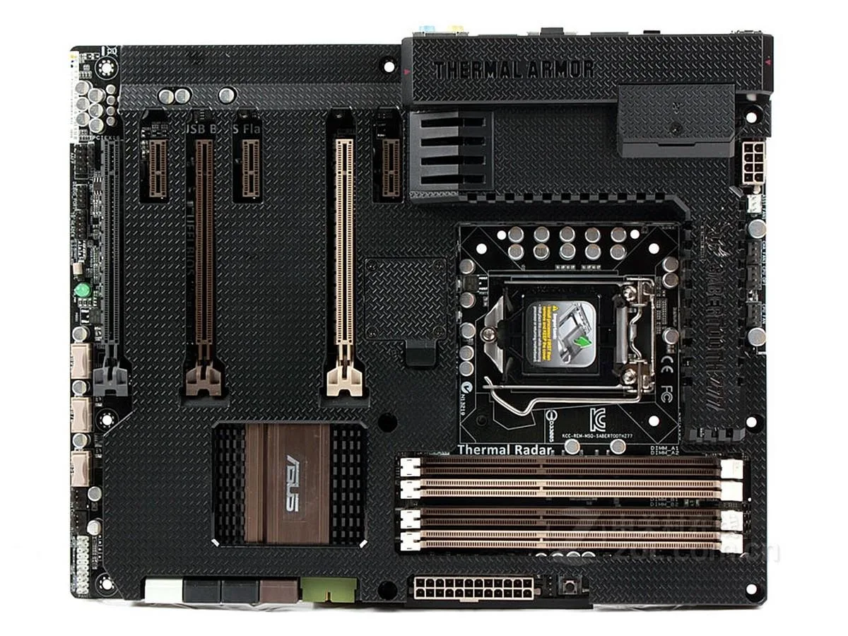 ASUS SABERTOOTH Z77 ATX motherboard in matte black with thermal armor, LGA 1155 socket, DDR3 slots, and SATA ports