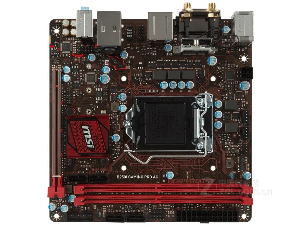 Compact Mini-ITX board, black PCB with silver heatsinks and rear I/O shield