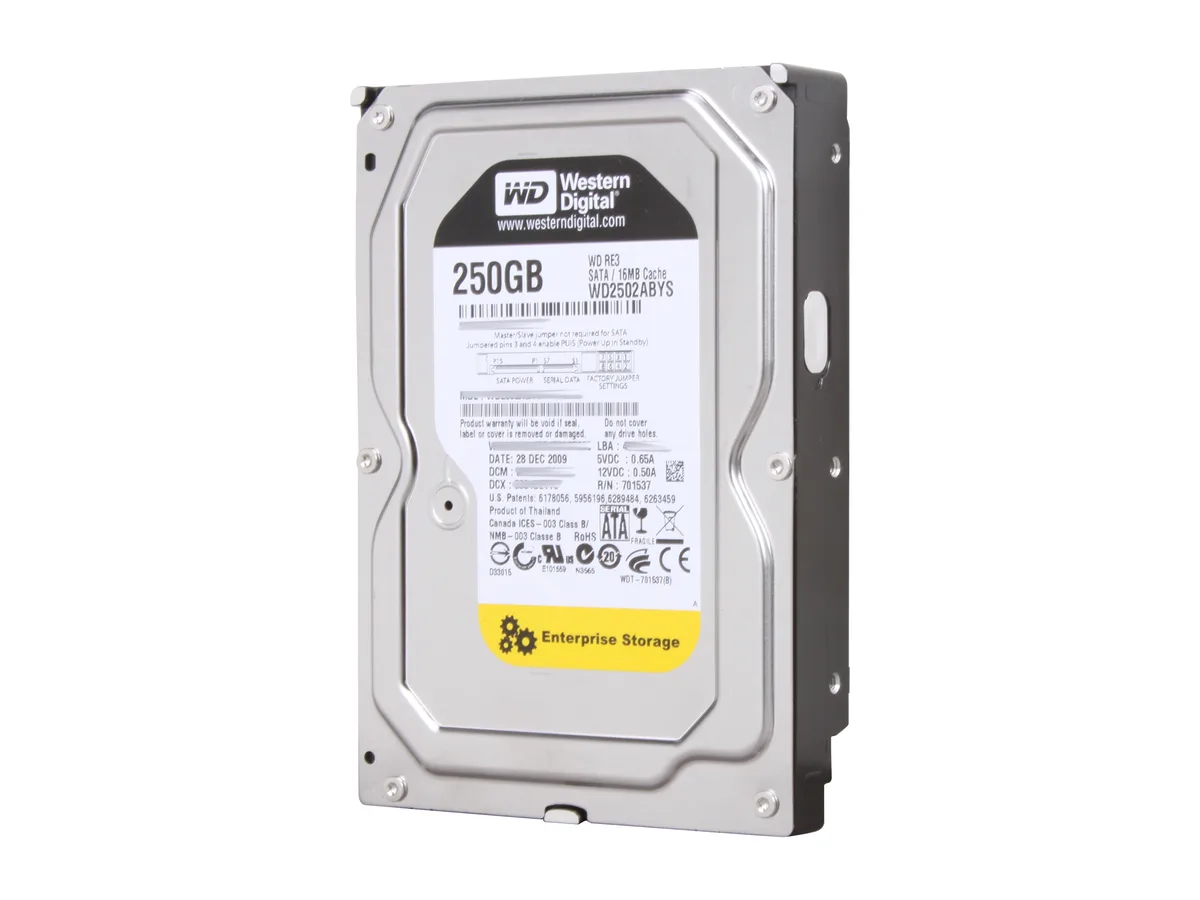 Silver 3.5 inch bare hard drive with exposed circuit board