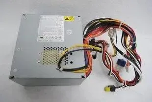 Silver ATX power supply unit with fan grille and cable bundle