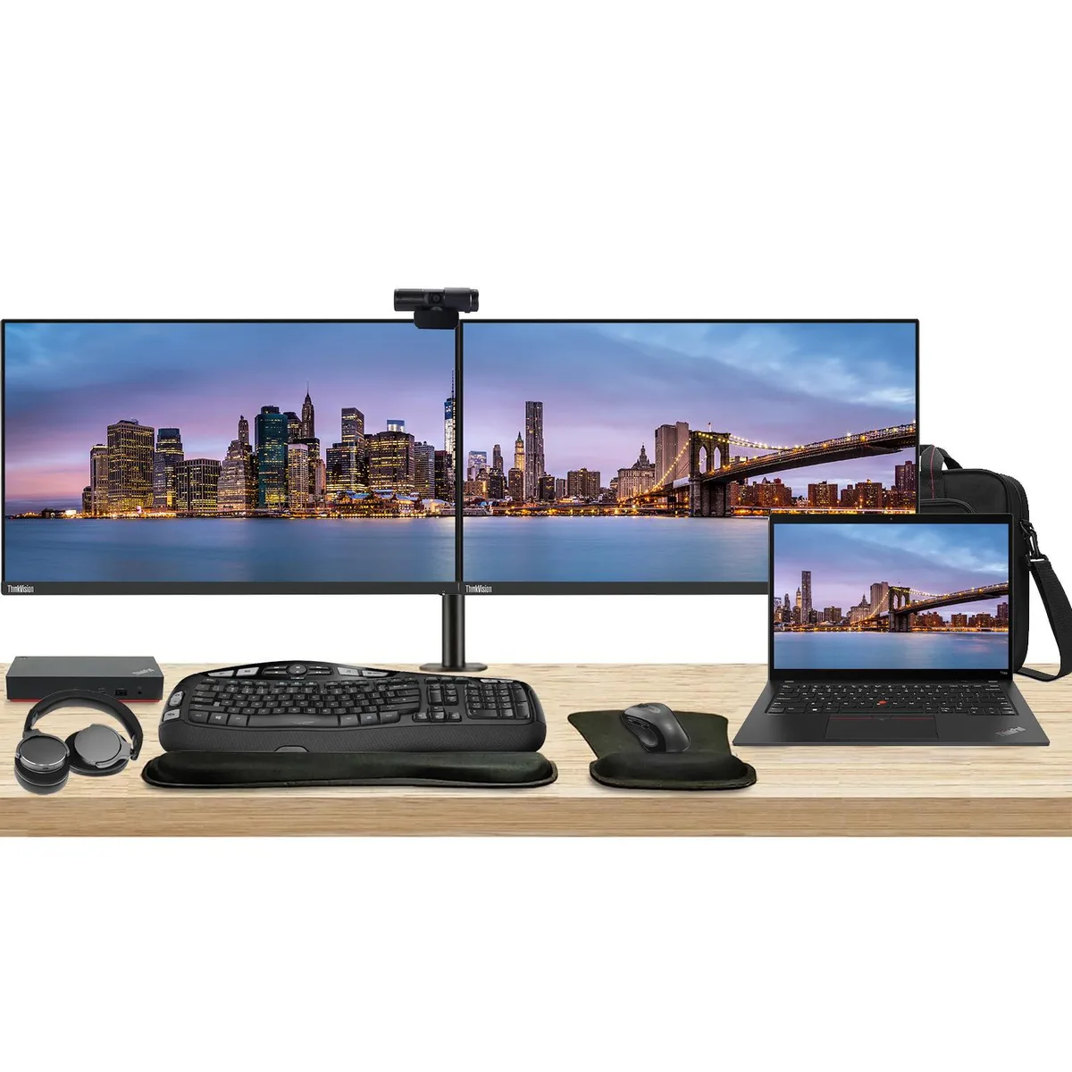 Open laptop with touchscreen beside two monitors on a dual stand, plus dock, keyboard, mouse, webcam, headphones