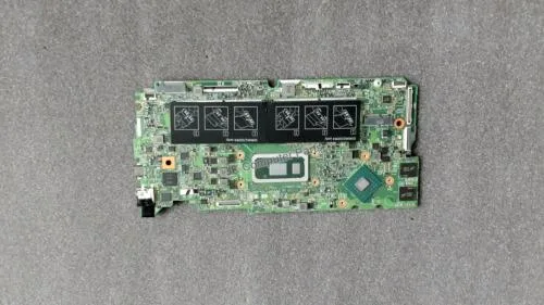 Green Dell laptop motherboard with silver CPU socket and black components