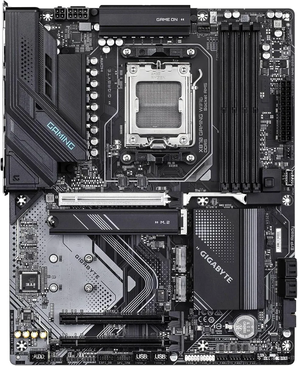 Rectangular ATX motherboard in dark finish with silver heatsinks and gold CPU socket visible