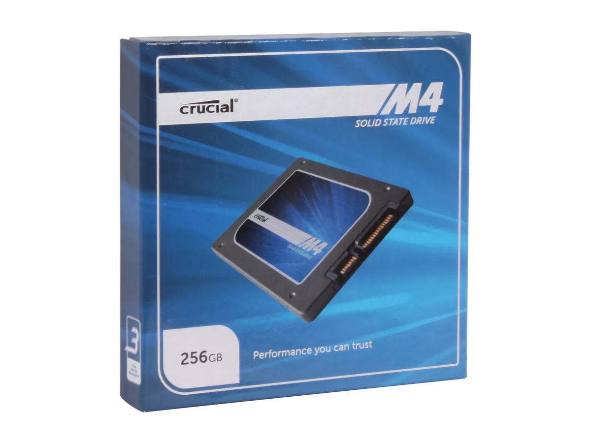 Silver rectangular 2.5 inch SATA SSD with label showing Crucial M4 256GB