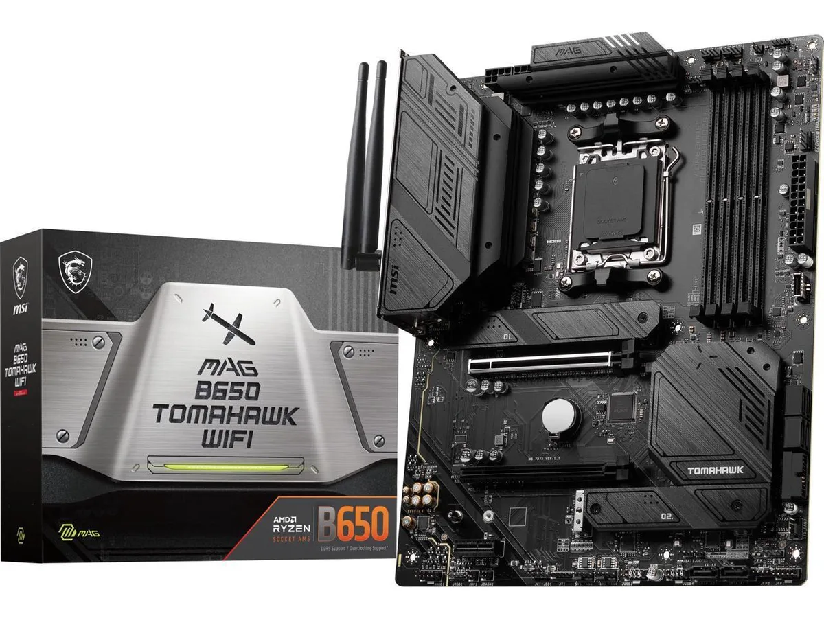 ATX motherboard with silver heatsinks and black PCB