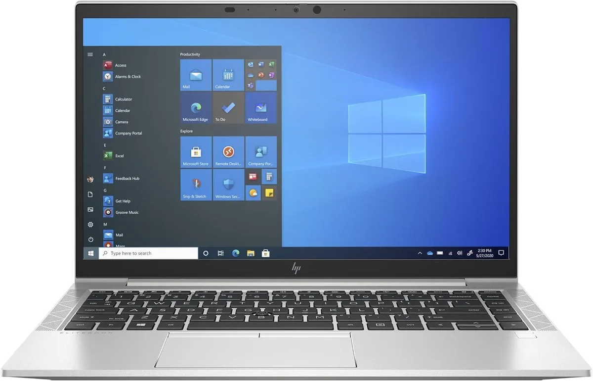 Silver 14-inch laptop with Spanish keyboard, closed lid showing HP EliteBook branding