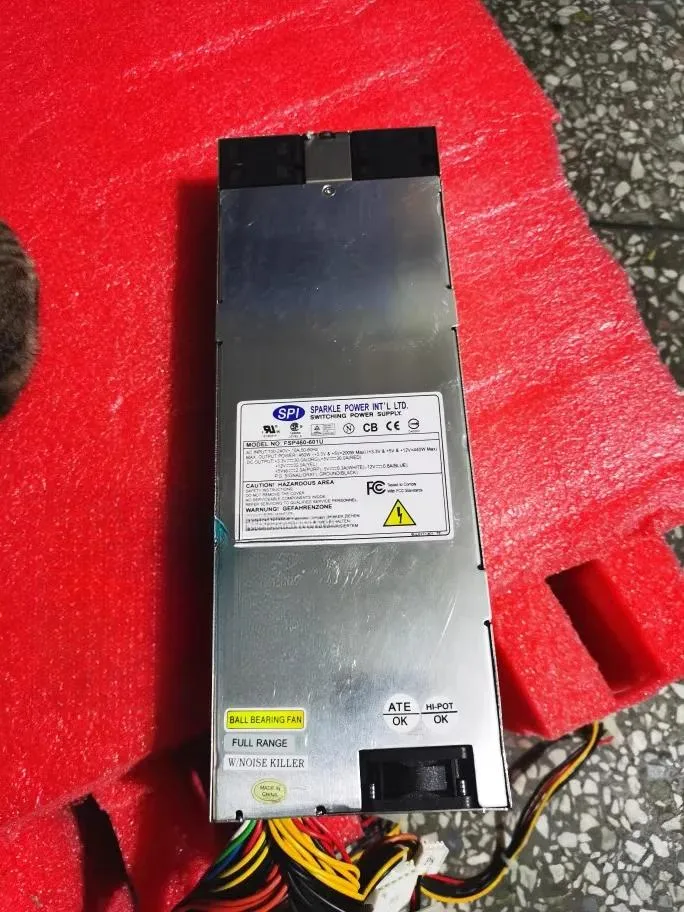 Silver rectangular 1U server PSU with rear fan grille and IEC inlet