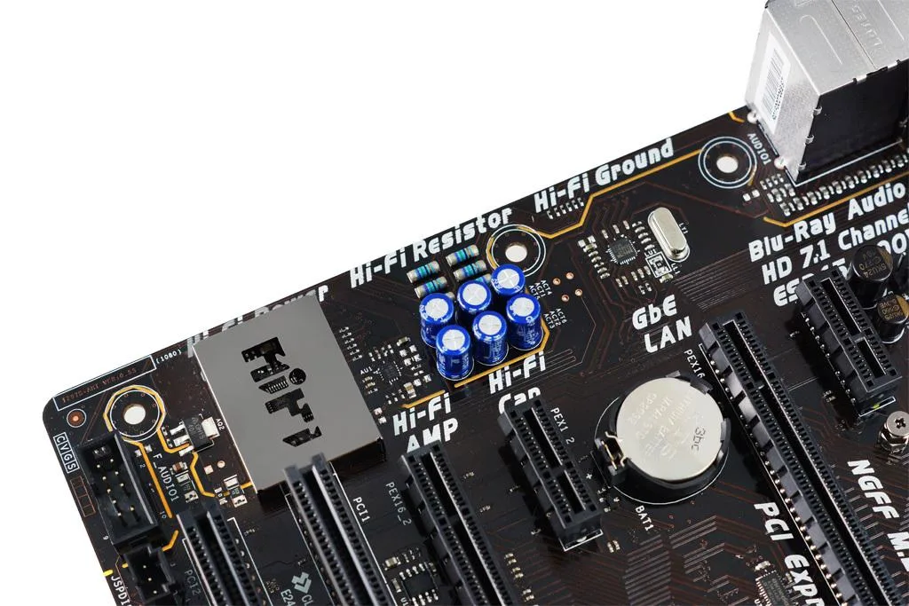 ATX motherboard with black PCB silver heatsinks and blue slots