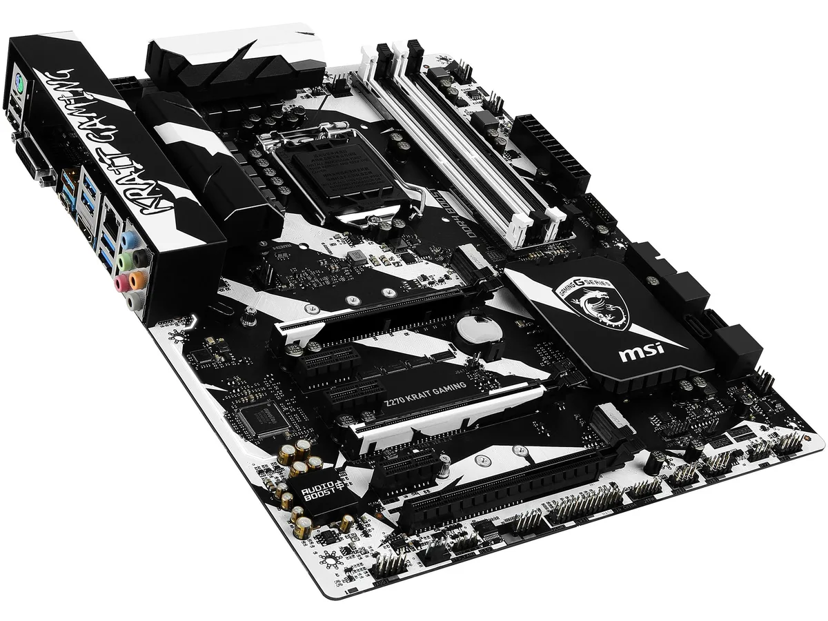 Black ATX motherboard with silver heatsinks and four DDR4 slots