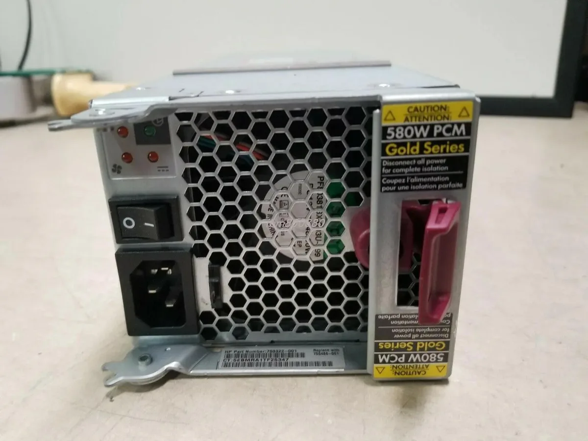Rectangular silver ATX power supply unit with ventilation grille and rear connector socket