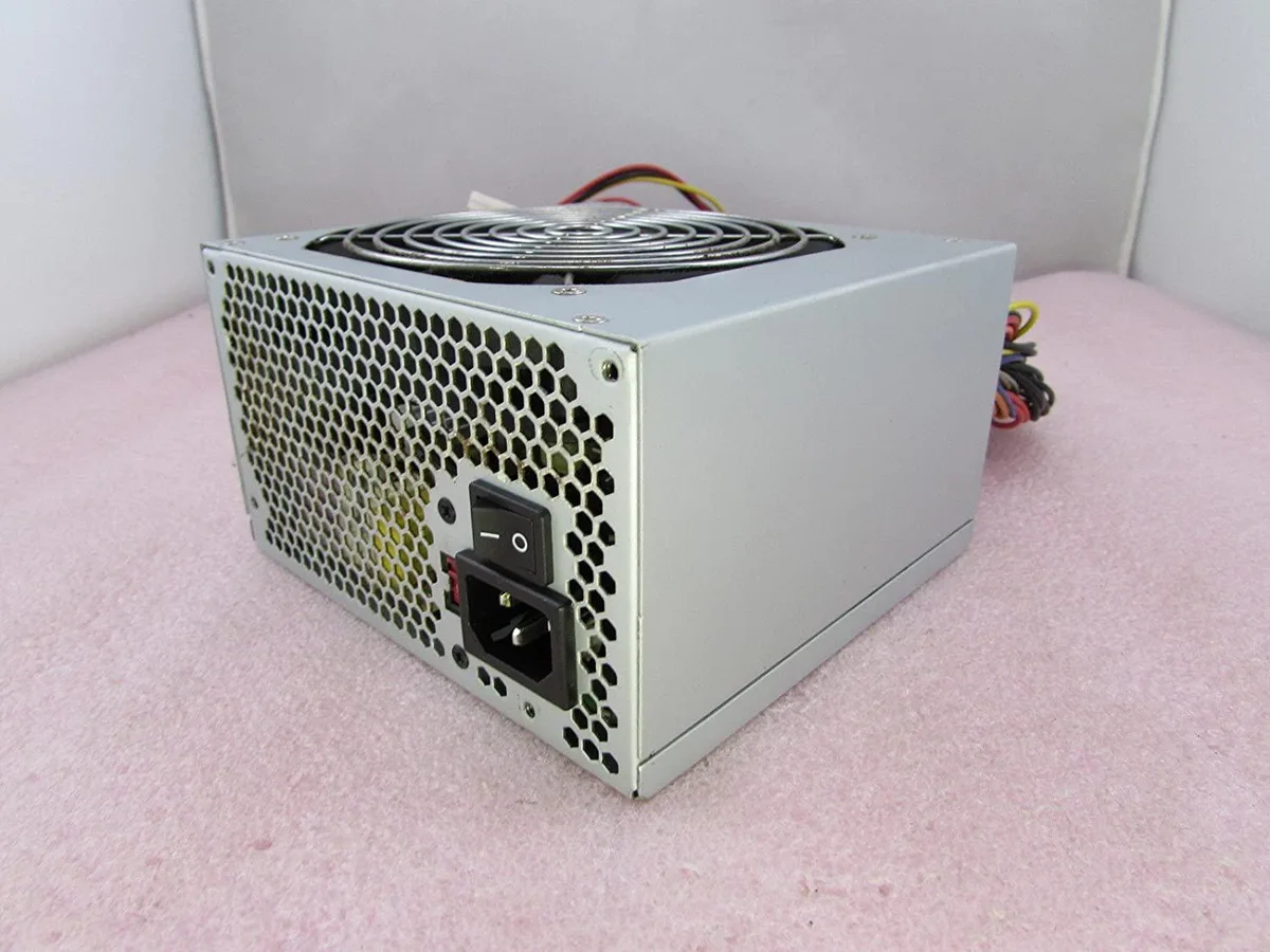 Rectangular metal ATX power supply unit with 120mm fan and cable bundle