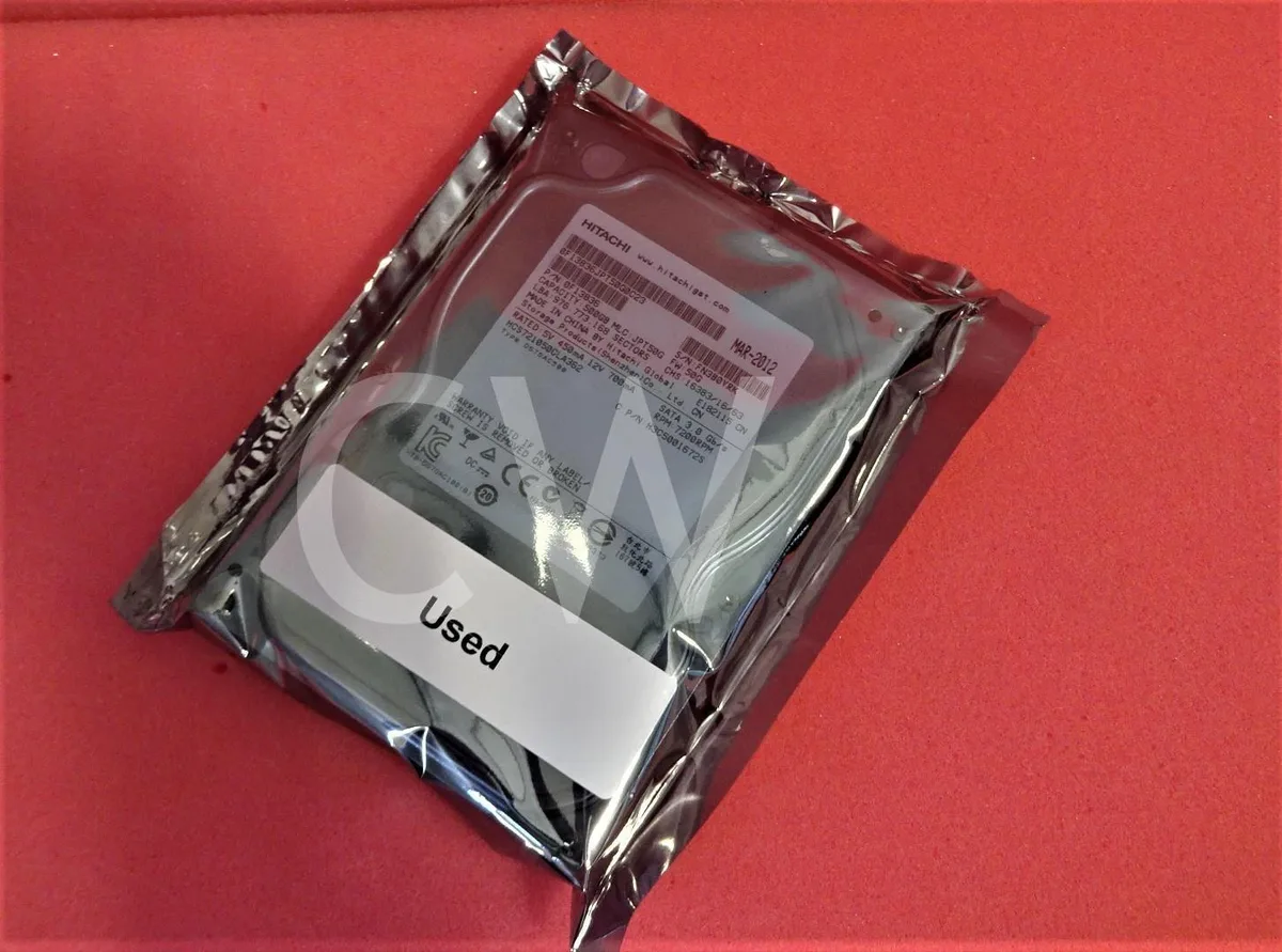 Silver 3.5 inch SATA hard drive with circuit board visible