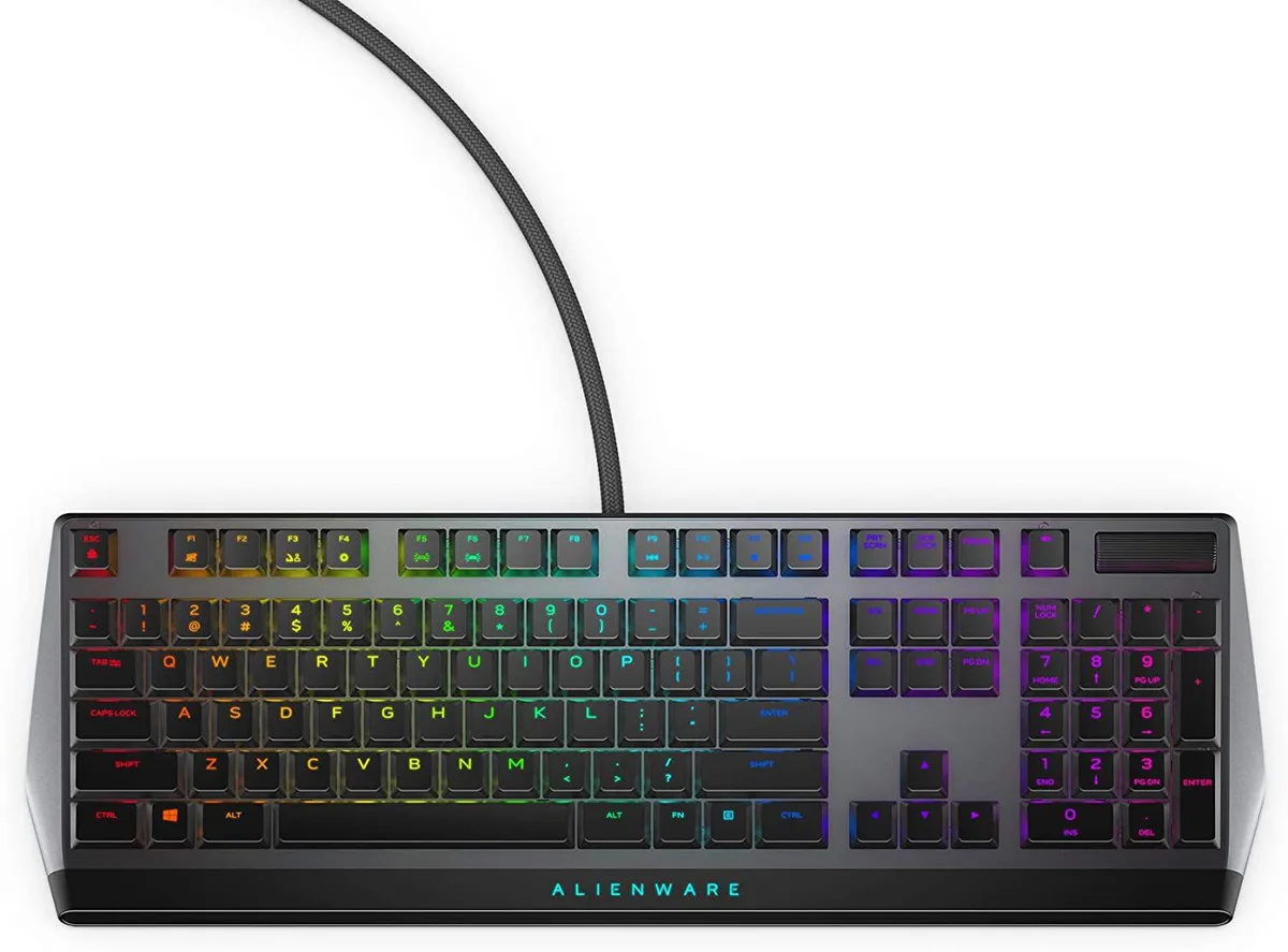 Low-profile gaming keyboard with floating keys, dark grey aluminium frame, per-key RGB lighting and media roller