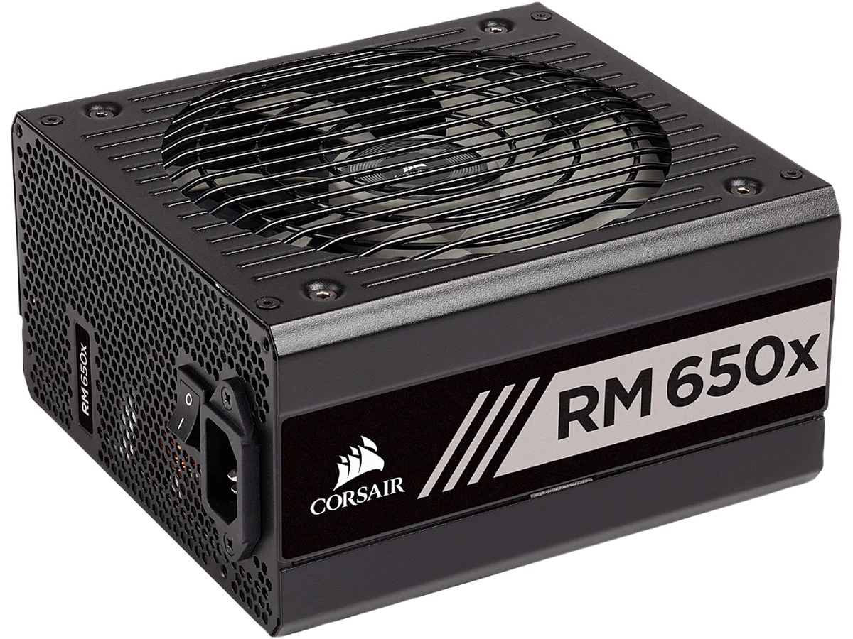 Black rectangular ATX power supply unit with modular cable ports and a 140mm fan grille