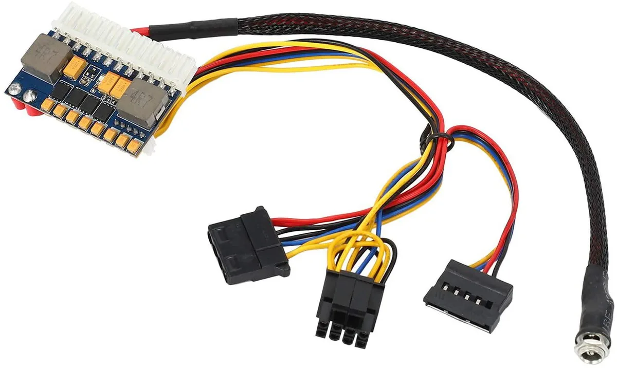 Compact blue white black Pico ATX PSU with 24 pin and SATA cables