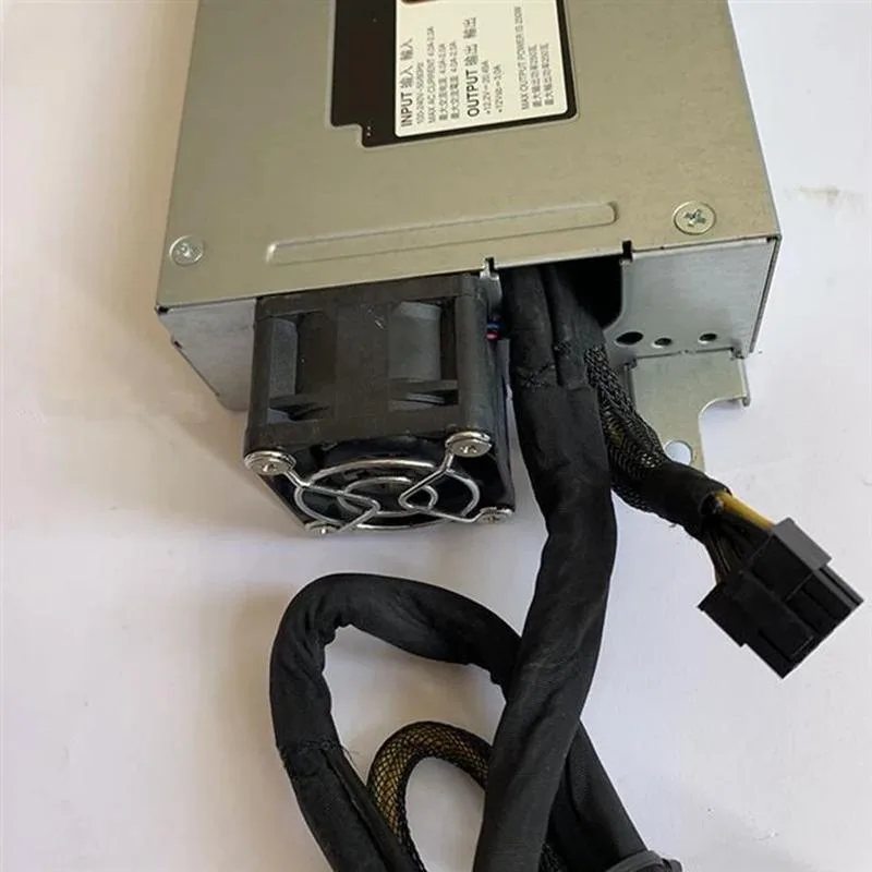 Rectangular ATX power supply unit in matte black finish with cooling fan grille visible