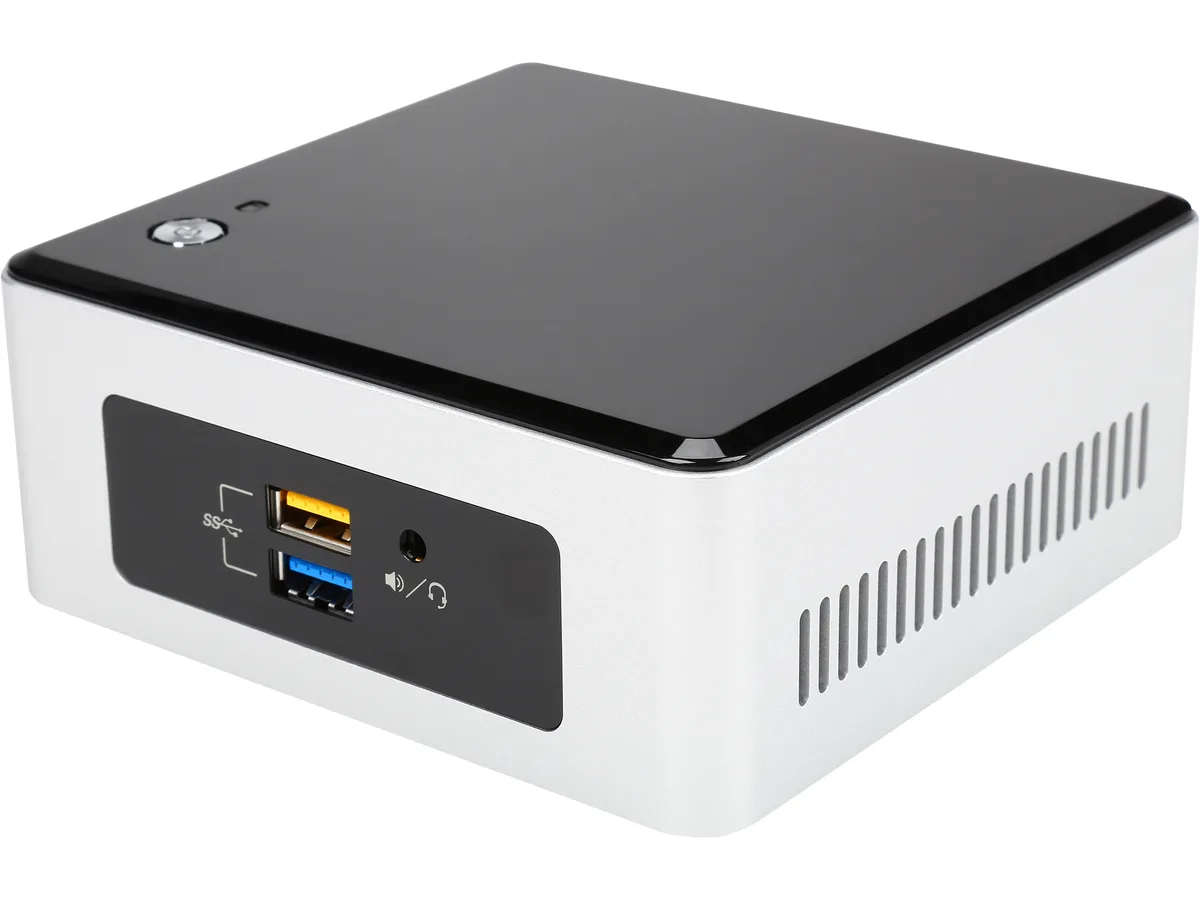 Small square black mini PC barebone unit with front ports and side card slot