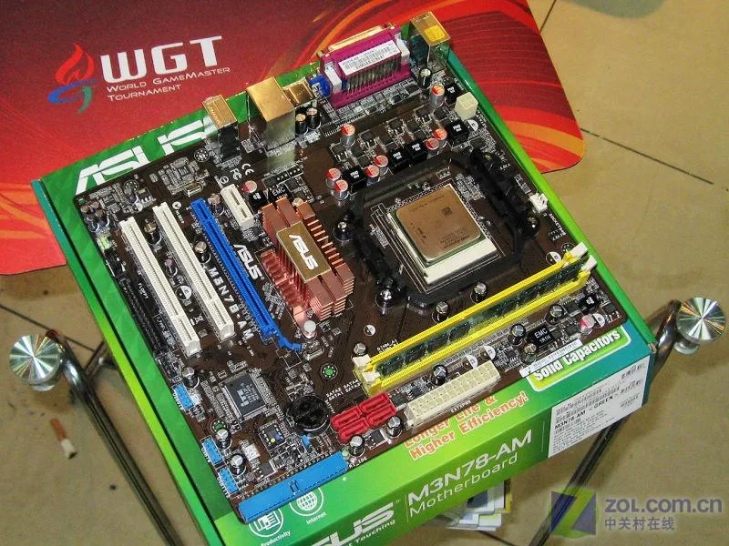 Green rectangular Micro ATX motherboard with silver CPU socket and DDR2 memory slots