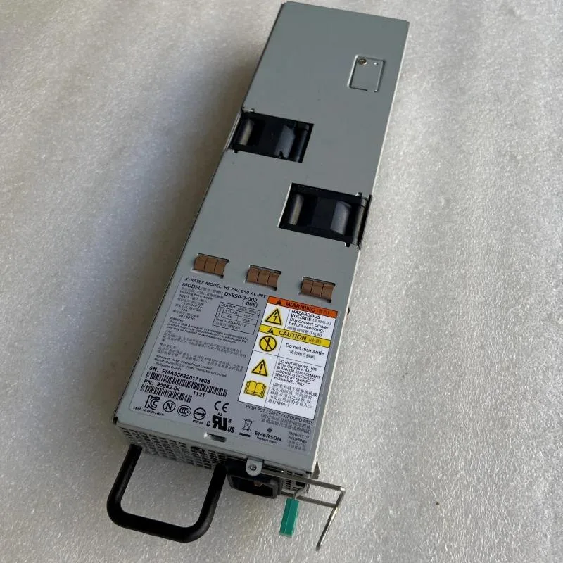 Rectangular black ATX power supply unit with ventilation grille and power connector visible