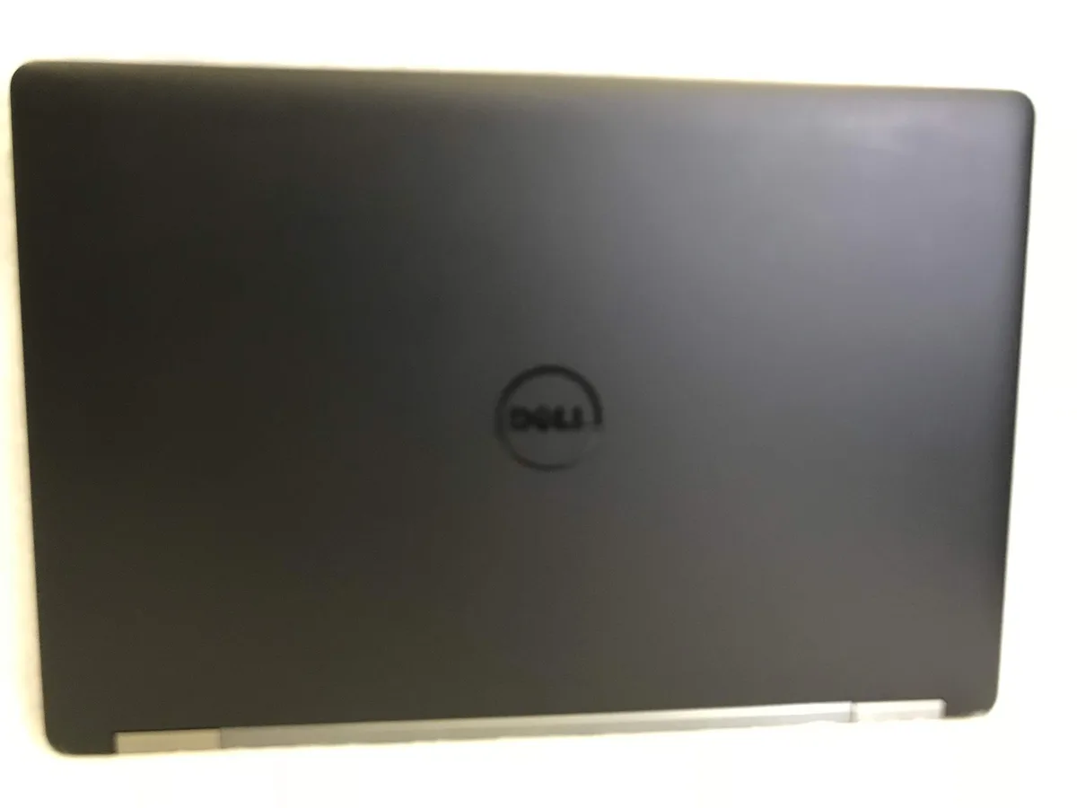 Silver Dell Latitude E5570 laptop closed showing 15.6 inch matte screen and webcam