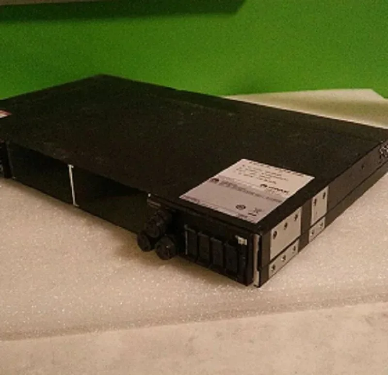Rectangular ATX power supply unit, matte metal casing, standard rear fan grille, modular cable sockets visible, labelled ETP48120