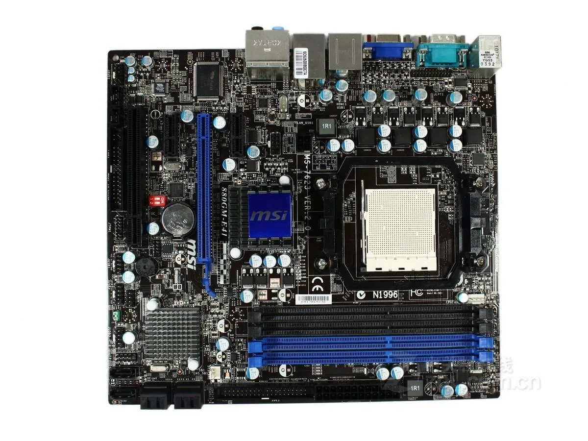 Green rectangular micro-ATX motherboard with silver heatsinks and black expansion slots