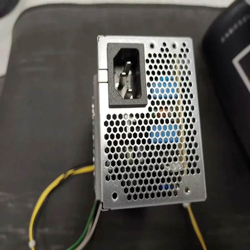 KHACHIMO 450W ATX power supply unit in black metal casing with rear fan grille and modular cable connectors