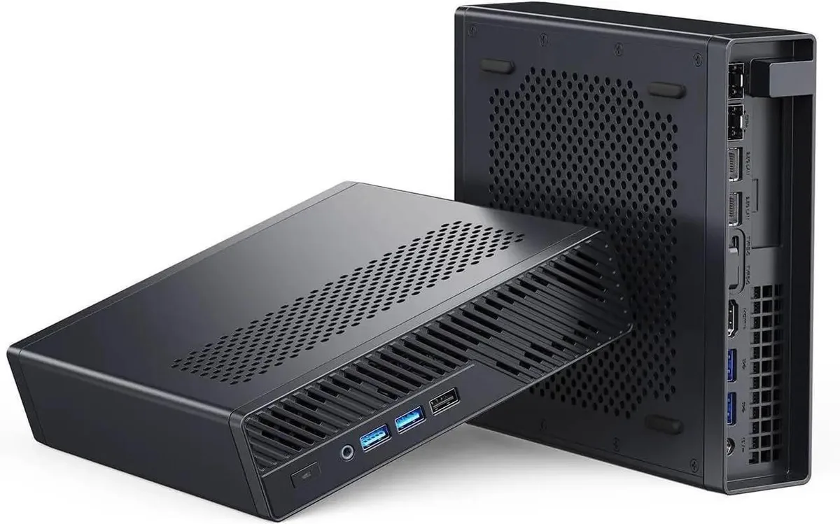 Small black square mini PC with front ports and dual fans visible