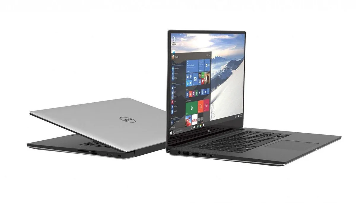 Silver ultra-thin 13.3 inch touchscreen laptop with minimal bezels and backlit keyboard