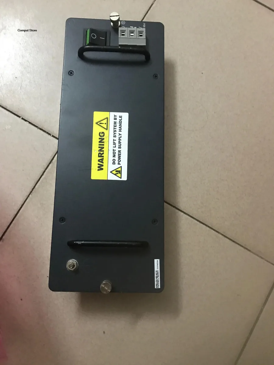 Black rectangular ATX power supply unit with ventilation grille and label showing model numbers