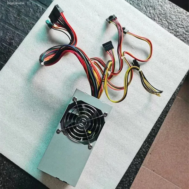Compact TFX power supply unit with matte black finish and rear fan grille