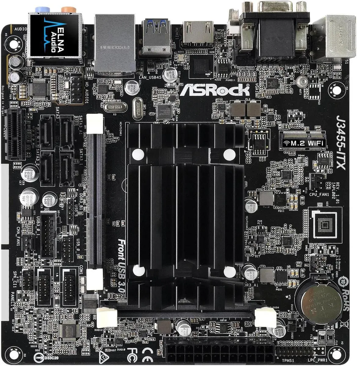 Green Mini-ITX board with silver CPU cooler and black ports