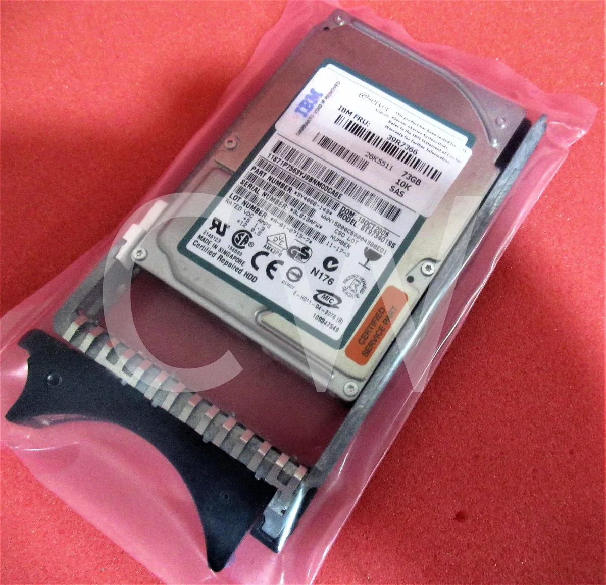 A silver 2.5 inch SAS hard drive mounted in a black metal caddy